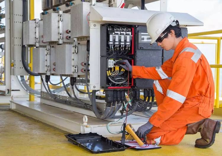 Engineers performing final testing and commissioning of a new power plant